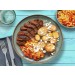 American Cajun Rindersteak mit Mais-Tomaten-Salsa, Kartoffeln und Feta 